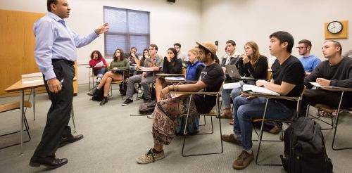 professor alwishah lectures to a group of philosophy students